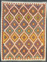 A Turkish Anatolian Kilim rug, knotted with a traditional geometric design, in red, turquoise, blue,