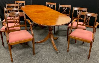A George III style mahogany D-end pedestal dining table with set of eight dining chairs (six