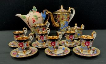 A Capodimonte Italian porcelain Coffee set, for six, decorated with flowers on a black ground, inc