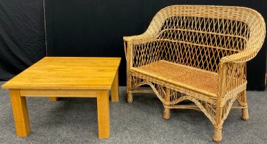 A Cane and wickerwork conservatory sofa, 98cm high x 118cm wide x 54cm deep; and a golden oak coffee