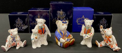 A group of five Royal Crown Derby miniature teddies including; School boy teddy, gold stopper,