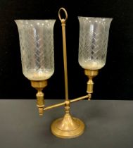 A 20th century cut glass and brass two branch storm lamp style table lamp, 37cm high.