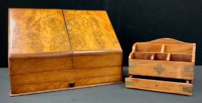 A Victorian brass inlaid burr walnut slope front stationery box, fitted interior, base drawer;