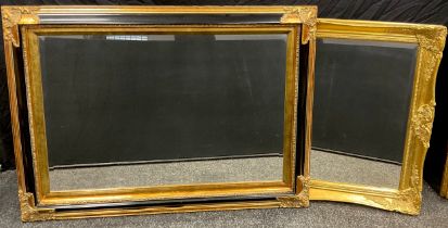 A large 19th century style wall mirror, gilt and ebonised wood effect frame, bevelled glass, 81cm
