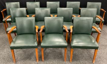 A set of twelve boardroom armchairs, mahogany arms, and legs, green leatherette upholstered backs