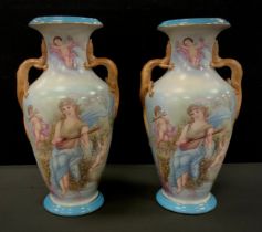 A pair of blue baluster porcelain vases, twin lizard handles, decorated with printed ladies and