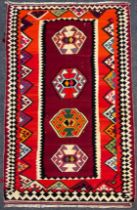 A South West Persian Qashgai Kilim rug, hand-knotted with a row of four hexagonal-shaped