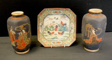 A pair of Japanese Satsuma pottery hexagonal vases, decorated with musician flautist and