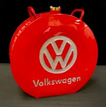 A round Volkswagen red replica oil can, 36cm high