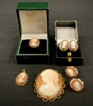 A pair of carved cameo 9ct gold mounted oval earrings, portraits of lady's with long hair, another