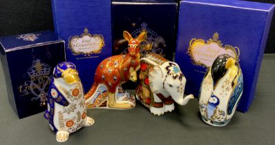 A group of four Royal Crown Derby paperweights including; Kangaroo, Platypus, Elephant, Penguin