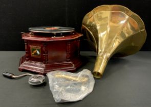 A replica early 20th century style decorative gramophone, conforming horn, 22cm high