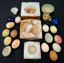 Specimen stones including; alabaster faceted ashtray, 16cm long, another similar; onyx bowl, 10cm