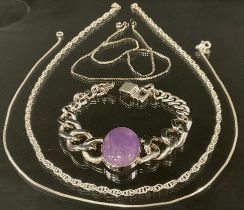 A silvarious 925 silver pale amethyst cabochon set tapering curb link bracelet, stamped 925,