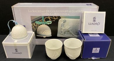 Lladro from the Collectors Society, a pair of moulded beakers,9cm high, square wallet, 8.5cm x 8.