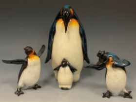 An Aynsley Bone China blue glaze model of Mother Penguin and calf, 25cm high, two conforming