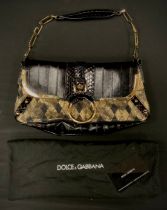 A Dolce & Gabbana black leather and gold fabric handbag, interconnected D & G letter strap, loop