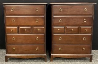 A pair of Stag Furniture ‘Minstrel’ design tall boy chests of drawers, measuring 112cm high x 82cm