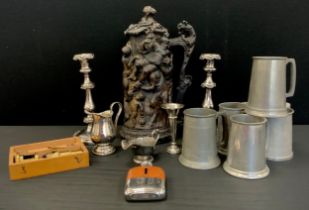 A pair of 19th century silver plated candlesticks, weighted base, 25.5cm high, pewter tankards,