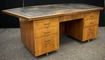 A mid 20th century walnut veneered Registrar's or clerks Office pedestal desk, by Carson’s Office