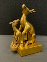 A Chinese gilt bronze coloured metal double deer seal stamp, 19cm high