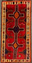 A South West Persian Lori Rug / carpet, hand-knotted in rich tones of red, deep blue, orange, cream,