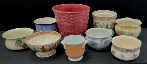 A quantity of jardinières including majolica; etc