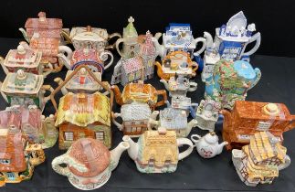 Novelty tea pots including Pianos, Aga Cookers, Cottages and buildings; etc (approx.30)