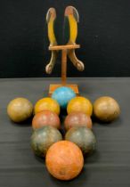 A set of ten French Petanque/Boules painted wooden balls, inc yellow, red, blue and black etc,