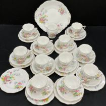 A Queen Anne Old Country Spray pattern tea set, for eleven inc milk jug, cups, saucers, bread