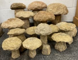 A group of small Derbyshire Gristone straddle stones or decorative garden mushrooms, approx. 15.