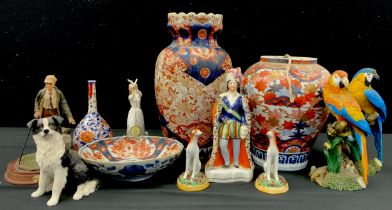 Ceramics - Staffordshire figure of King, conforming two dogs, Royal Doulton figure ‘Thinking of