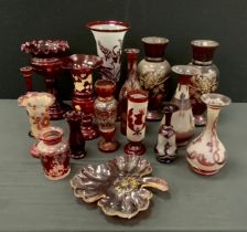 Victorian and later Ruby glass including; flared trumpet vase, 35cm high ,vine engraved bottle vase,