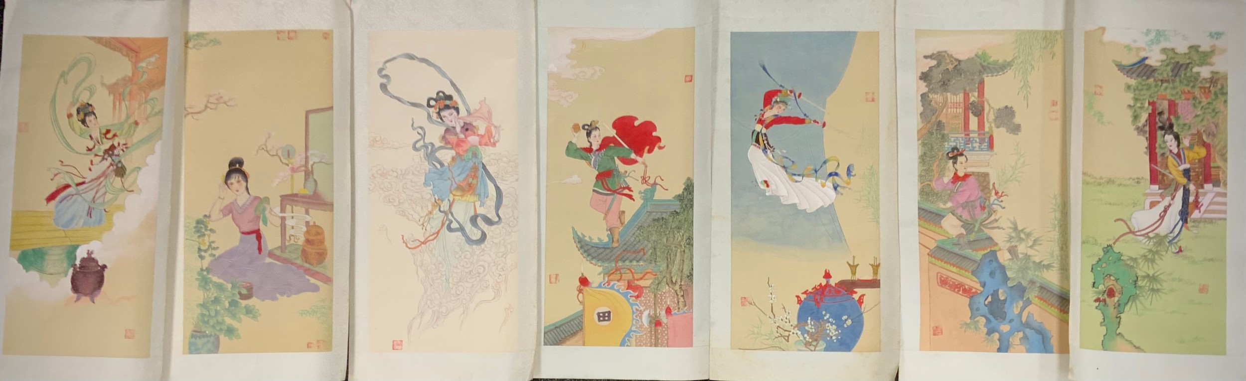 Oriental School - seven 20th century wood block and painted panels, possibly Ren Shuaiying, with