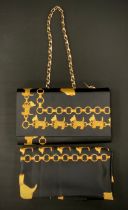 Fashion - an Italian Terrier dog and chain link pattern handbag and scarf, the black grounds with