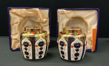 A pair of Royal Crown Derby 1128 pattern ‘ Old Imari’ jars and covers, 12cm high, both firsts (2)