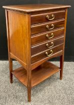 An Edwardian mahogany five drawer music cabinet, 84cm high x 52.5cm wide x 38cm.