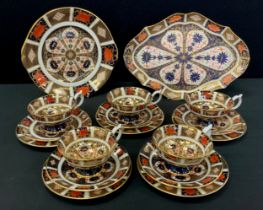 Royal Crown Derby - an 1128 Imari part tea set, five Elizabeth shaped cups and saucers, five 16cm