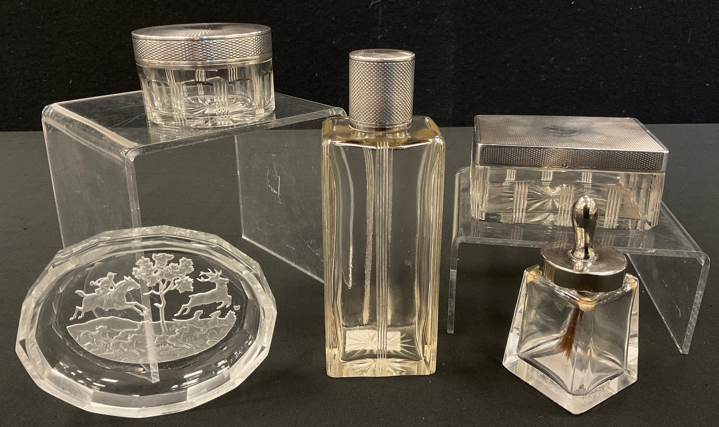 A French Maquet Paris silver topped cut glass three piece part dressing table set, scent bottle,