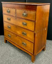 A Victorian oak chest of drawers, mahogany veneered frieze, two short, over three graduated long,