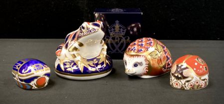 Royal Crown Derby paperweights including; ‘Frog', 'Orchard Hedgehog’,’ Millennium bug’, ‘Lady bird',