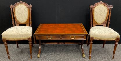 A pair of Edwardian walnut bedroom chairs, carved and upholstered backs, turned and fluted legs; a