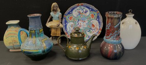 An Eltonware incised and moulded vase, with insects and floral decoration, red to purple ground,