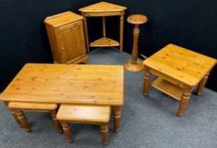 Pine furniture - A coffee table with nested pair of small side tables, 46cm high x 110.5cm x 58cm; a