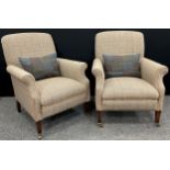 A pair of Harris Tweed armchairs, tapering square legs, brass casters, 88cm high x 72cm wide x