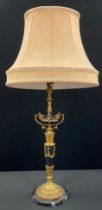 A gilt metal and black marble table lamp, Neoclassical swaged column, stepped foot, 54cm high to