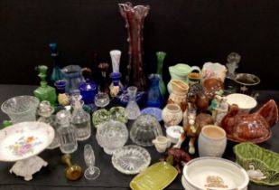 Ceramics and glass - a set of three 19th century cut glass decanters, maiolica glaze hen basket,