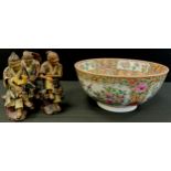 A 20th century Chinese famille rose bowl, six character mark to base, 25cm dia; a set of three