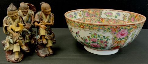 A 20th century Chinese famille rose bowl, six character mark to base, 25cm dia; a set of three