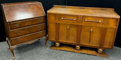 A mid 20th century oak sideboard, 90.5cm x 137cm wide x 51.5cm deep; a walnut veneered bureau, (2).